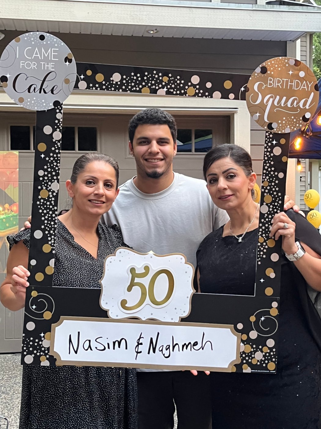 Sina with family at a 50th birthday